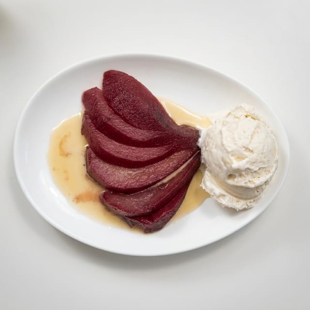 Poached Pear with Vanilla Ice Cream.